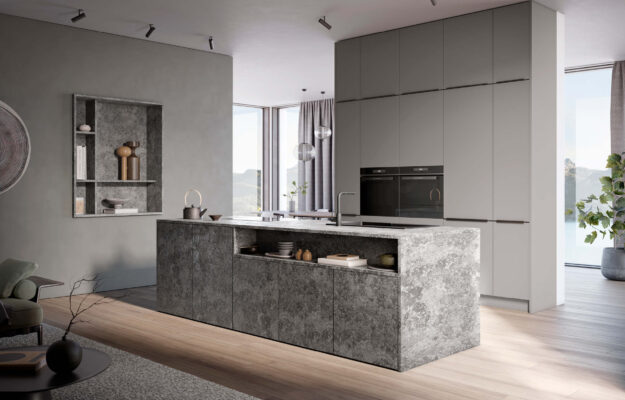 Moderne Küchen mit Kücheninsel aus dunklem Stein mit Spülbecken und Stauraum, kombiniert mit greigen Hochschränken und Einbaugeräten im hellen Wohnraum - von Häcker